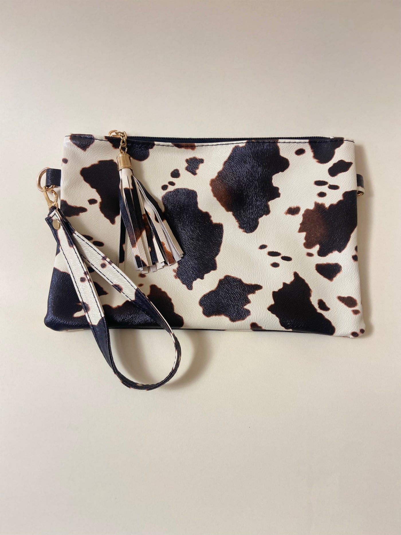 Headed To Nashville Vegan Leather Cow Print Clutch